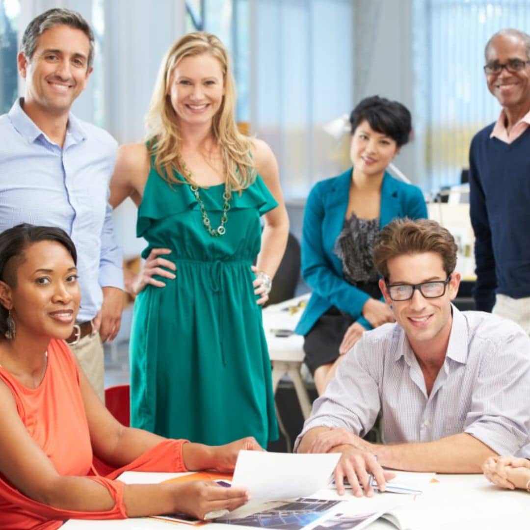 A smiling office team working on a project