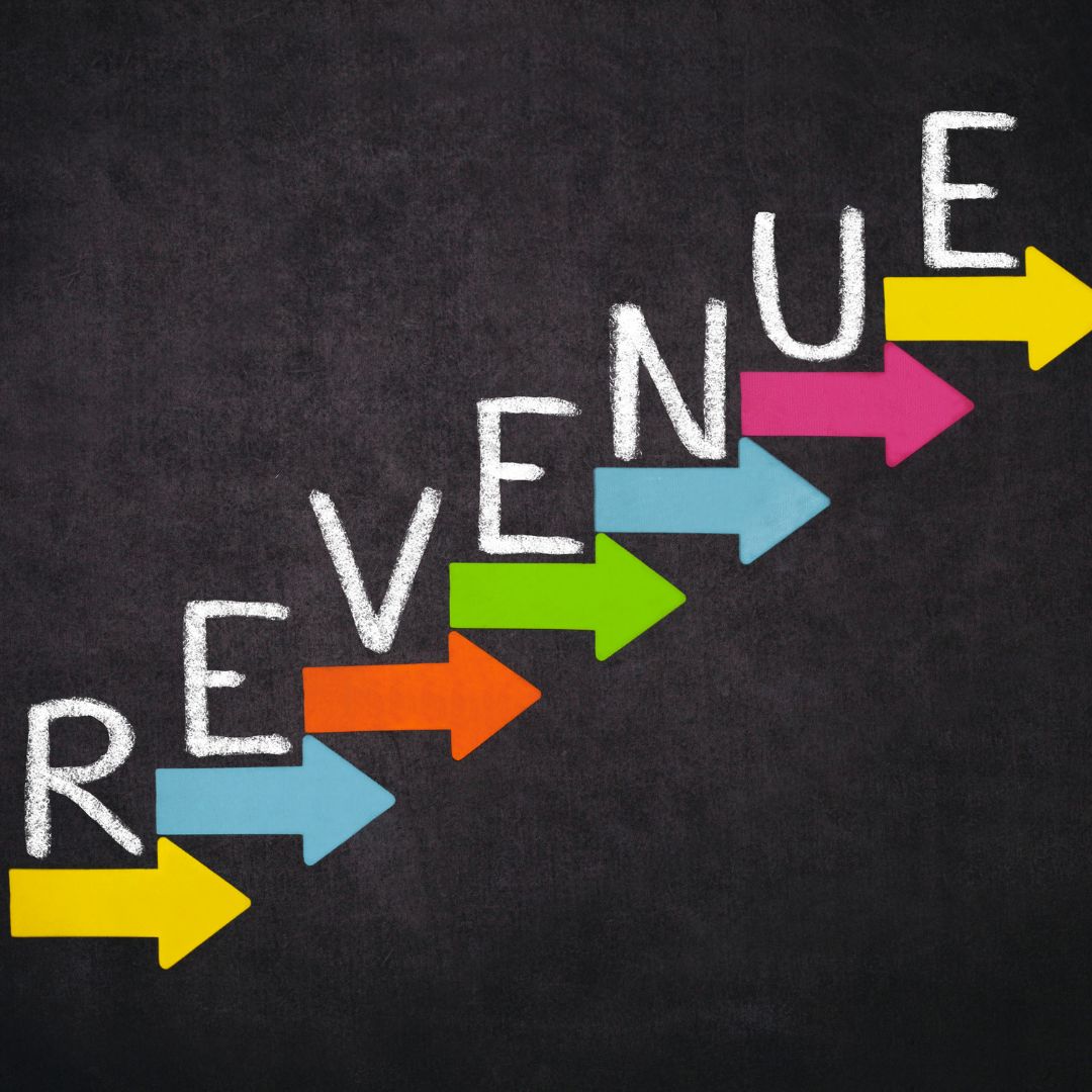 Colorful arrows pointing upward next to the word "REVENUE" on a dark background, symbolizing growth and success for business owners.