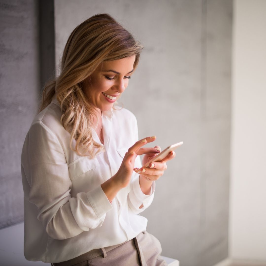 Woman engaging on social media on her phone