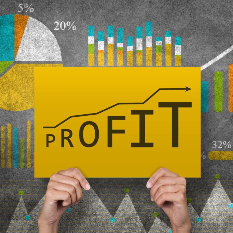 A yellow sign that says "profit" in front of charts and graphs
