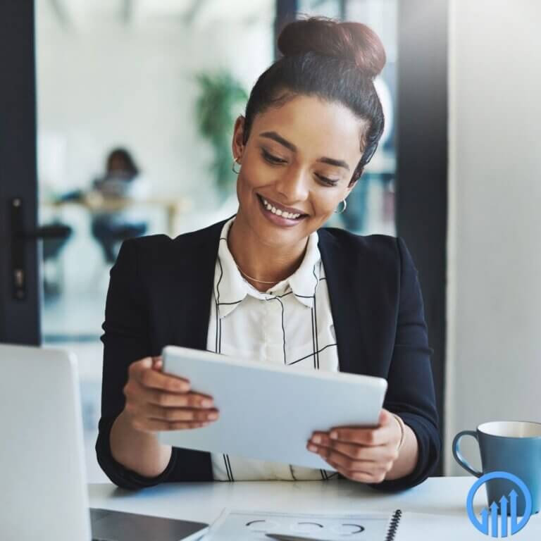 smiling businesswoman reading a concise report