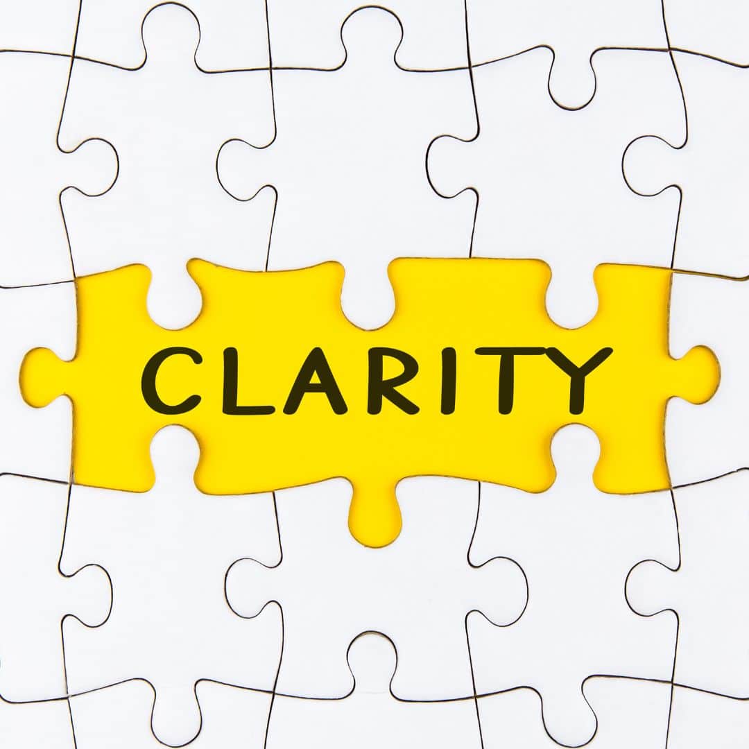 white puzzle pieces with a yellow enter that says "clarity"