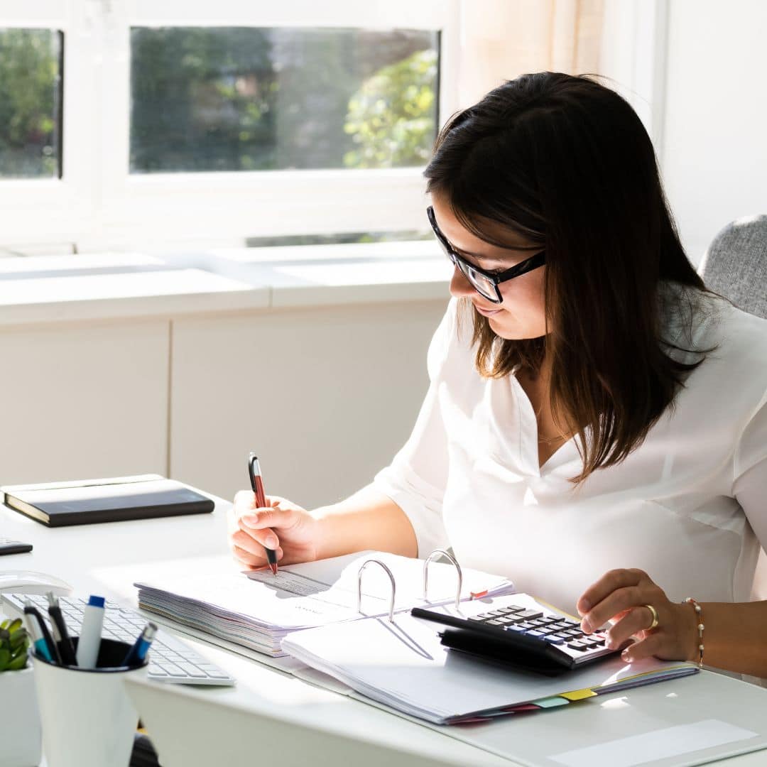 A bookkeeper working on her tasks