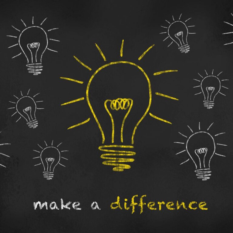 Light bulbs drawn on a chalkboard with the words "make a difference"