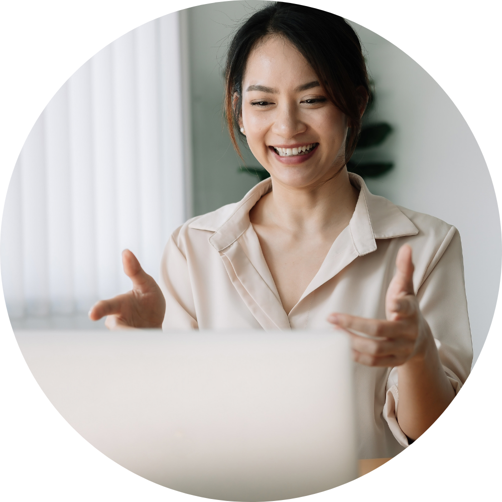 Smiling woman engaging in video training session, emphasizing sales systems and team training.